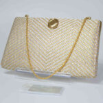 front side of gold strings kimono bag