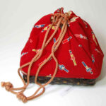 red kimono drawstring pouch called "Kinchaku"