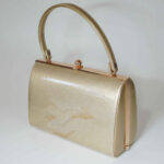 gold-colored kimono clasp bag