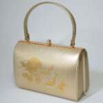 gold-colored kimono clasp bag